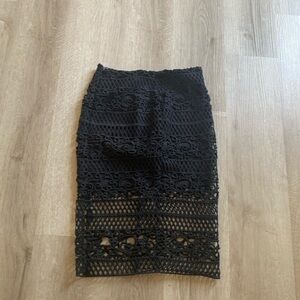 Express never worn size 2 black mini skirt with longer overlay very unique